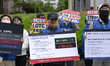 Families of victims from the Jeju Air crash at Muan Airport hold a press conference in fro...
