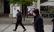 A sign counting the days journalist Andrzej Poczobut is in Belarusian captivity is seen in...
