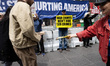 Members and supporters of Rise and Resist and Truth Tuesdays gather for a weekly protest o...