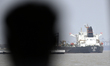 India-flagged tanker Desh Garima unloads crude oil at an offloading terminal after transit...