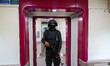 A Railway Protection Force (RPF) personnel stands guard inside a coach of the Vande Bharat...