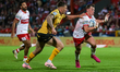 Jack Broadbent shrugs off Alex Mellor during the BetFred Super League match between Hull K...