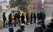 Bulldozers demolish shelters at a settlement in Kathmandu, Nepal, on May 2, 2026, as autho...