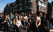 Revelers participate in a street rave called Rave voor de Rafelranden in Utrecht, Netherla...