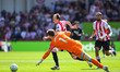 Mads Hermansen, goalkeeper of West Ham United, challenges Mikkel Damsgaard of Brentford du...