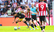 Mathias Jensen of Brentford challenges Mateus Fernandes of West Ham United during the Prem...