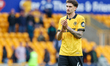 Santiago Bueno of Wolverhampton Wanderers thanks the fans for their support at full-time d...