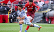 Toronto FC striker Emilio Aristizabal (#17) shoots the ball while San Jose Earthquakes mid...