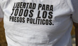 A person wears a T-shirt with the message ''Freedom for all Political Prisoners'' during a...