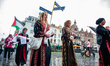 People march in silence with dolls in white sheets and red stains in Nijmegen, Netherlands...