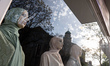 Mannequins displaying fashion for Muslim women and the reflection of Neukoelln's town hall...