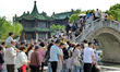 Tourists queue to cross the Twenty-Four Bridges in Slender West Lake Scenic Area of Yangzh...