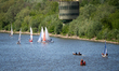 Small sailboats and motorboats move along the Vistula River with a supplementary infiltrat...