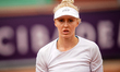 Aliona Falei of Belarus competes in the round of 32 match against Donna Vekic of Croatia d...