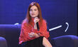 Peruvian singer Nicole Zignago speaks during a press conference to promote her 'Enamorada'...