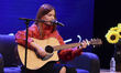 Peruvian singer Nicole Zignago performs during a press conference to promote her 'Enamorad...