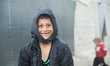 Children play in a refugee camp near the Turkish border on World Children's Day in Aleppo,...