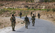 Syrian opposition fighters engage in battles in northern Syria on September 4, 2016. 