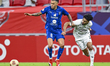 Tarek Salman of Al Sadd SC and Edmilson Junior of Al Duhail SC compete during the Amir Cup...