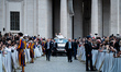 Pope Leo XIV waves to the crowd during the weekly general audience at St. Peter's Square i...