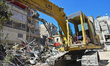 First responders inspect the rubble of a collapsed building in Beirut's southern suburb of...