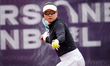 Hanyu Guo of China competes during the round of 32 match against Anastasia Gasanova of Rus...