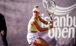Laura Pigossi of Brazil competes against Lucia Cortez Llorca of Spain during the round of...