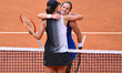 Iga Natalia Swiatek of Poland and Catherine McNally of the United States at the end of the...