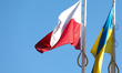Polish and Ukrainian flags are seen on a street in Gdansk, Poland, on April 20, 2026. 