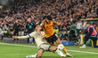 Ryan Giles of Hull City is tackled by Femi Azeez of Millwall during the Sky Bet Championsh...