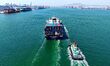 A cargo ship loaded with foreign trade containers enters Qingdao Port in Qingdao City, Sha...