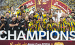 Al Gharafa SC players celebrate with the trophy after winning the Amir Cup 2026 Final matc...
