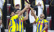 Yacine Brahimi (right), Ferjani Sassi (second from left), and Ahmed Al-Ganehi (left) of Al...
