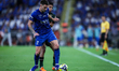 Sergej Milinkovic-Savic of Al Hilal battles for possession with Abdulrahman Al-Dosari of A...