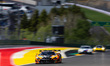 Antares Au (HKG), Thomas Fleming (GBR), and Marvin Kirchhofer (GER) drive the #10 McLaren...