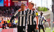 Harvey Barnes of Newcastle United celebrates his goal with teammates Jacob Ramsey and Yoan...