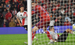 River player Tomas Galvan celebrates after the ball crosses the line following a shot by M...