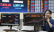 An electronic scoreboard at the Korea Exchange (KRX) in the Yeouido financial district of...