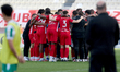Valletta players huddle ahead of the penalty shoot-out during the YoHealth Malta Premier L...