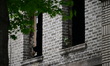 FDNY officials work at the scene of a fire that critically injures three children at 2609...