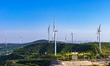 Wind turbines rotate at a wind farm in Sanmenxia City, Henan Province, China, on May 11, 2...