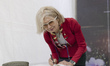 Emilia Gatto, Italian Ambassador to South Korea, signs a guestbook during the dedication c...
