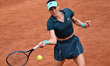 Sorana Cirstea of Romania competes against Jelena Ostapenko of Latvia during the Internazi...