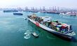 A cargo ship loaded with foreign trade containers departs from Qingdao Port in Qingdao Cit...
