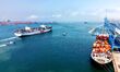 A cargo ship loaded with foreign trade containers departs from Qingdao Port in Qingdao Cit...