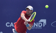Omar Jasika of Australia competes in the men's singles first round at the Karnataka Open A...
