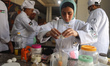 Palestinian youths learn culinary arts at Smile Kitchen Culinary Academy in Gaza City on M...