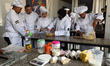 Palestinian youths learn culinary arts at Smile Kitchen Culinary Academy in Gaza City on M...