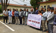 Members of the Federation of Contractors' Associations of Nepal stage a sit-in protest out...