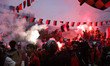Supporters of USMA Algiers celebrate their victory in the CAF Confederation Cup final 25/2...